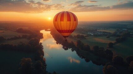Balloons soar in the sky under the soft morning sunlight with a beautiful view from above.
