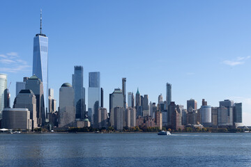 Fototapeta premium Panoramic view of New York, United States. New York city skyline in Midtown Manhattan. USA, NYC, NY, Manhattan. American big city. Lower Manhattan skyline. New York from New Jersey.