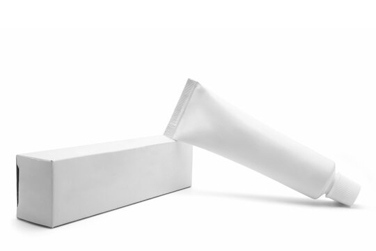 mockup white plastic tube with lid and cardboard box