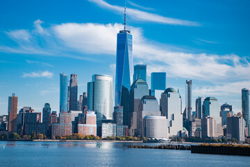 Obraz premium New York, United States. View of New York city skyline in Midtown Manhattan. USA, NYC, NY, Manhattan. American big city. Lower Manhattan skyline. New York from New Jersey. Downtown Manhattan.