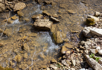 shallow mountain river, staritsa and nature walks, spring day