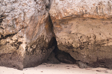 Obraz premium Rocky Cave Entrance on a Beach