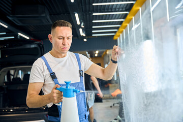 Pasting a transparent film on a car