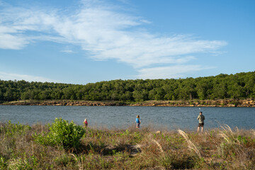 Family Fishes At Osage Point In Skiatook Lake, Oklahoma