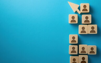 Wooden Blocks with People Icons and an Upward Arrow