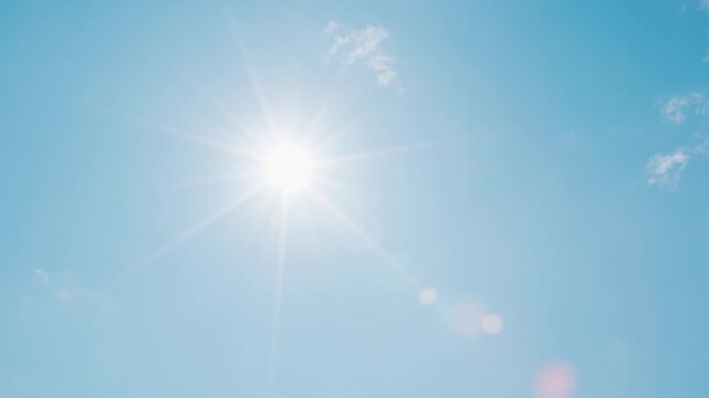 Summer sun flare with blue sky