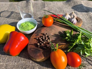 Vegetables and fruits are spices on a sliced board. High quality photo
