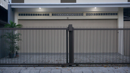 fence in front of a residential building. exterior design for real estate.