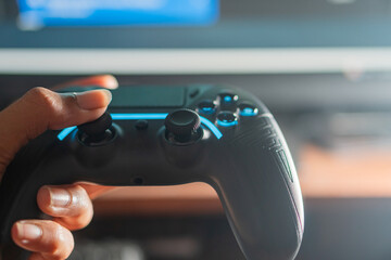 Close-up of a Hand Holding a Gaming Controller