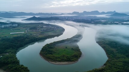 Obraz premium Aerial Panorama of Li River Winding Through Guilin’s Karst Scenery, Mist-Shrouded for an Ethereal and Empty Aura