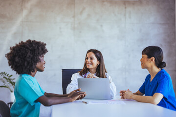 Medical Team Collaborating in a Modern Office Environment