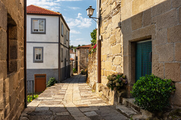 Old stone houses in narrow alleys in the old village of Castro Caldelas, Ribeira Sacra, Galicia.