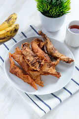 Pisang Aroma or Pisang Cokelat (Piscok), Indonesian traditional snack. Made of banana, chocolate and sugar wrapped in flour sheet. Perfect for recipe, article, catalogue, commercial. 