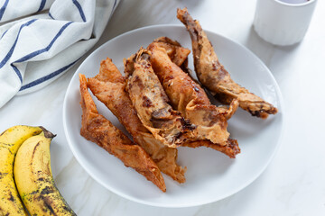 Pisang Aroma or Pisang Cokelat (Piscok), Indonesian traditional snack. Made of banana, chocolate and sugar wrapped in flour sheet. Perfect for recipe, article, catalogue, commercial. 