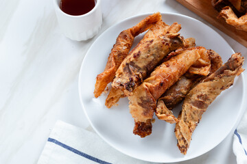 Pisang Aroma or Pisang Cokelat (Piscok), Indonesian traditional snack. Made of banana, chocolate and sugar wrapped in flour sheet. Perfect for recipe, article, catalogue, commercial. 