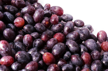 Grapes after washing on a white background. Clean cores of ripe grapes.