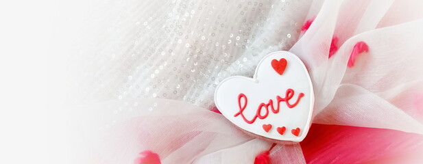 Heart with the word Love. Abstract Valentine Background. Artistic Heart-shaped Gingerbread. Top...