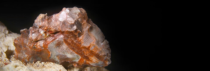 Obraz premium Yeelimite is rare precious natural geological stone on gradient background in low key, isolate. AI generated.