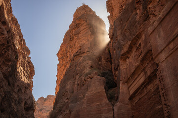 Rock Formation with Rays of Light in Petra. Beautiful Geological Landmark with Sun Ray in Jordan.