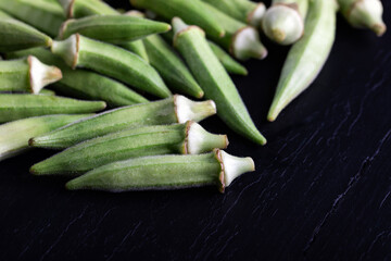 Fresh green okra, peeled and ready to cook.