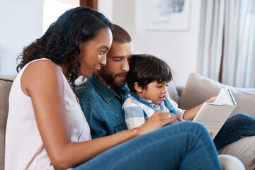 Kid, parents and reading book with family in home for learning, education or knowledge. Child, father and mother storytelling for fantasy fairytale, magic or interracial people relax together on sofa