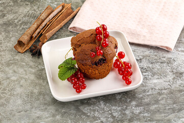 Delicous cupcake with red currant
