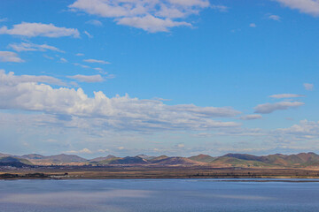 Han River with the background of field and mountain at Gaeseong-si of North Korea seen from Ganghwa Peace Observatory near Ganghwa-gun, South Korea
