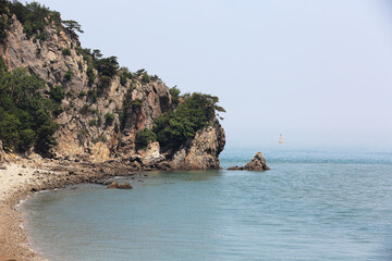 Sea rocks and cliffs at Seungbongdo Island near Jawol-myeon at Ongjin-gun, South Korea
