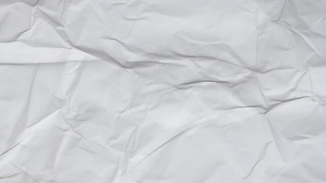 Stop motion of Crumpled white paper texture background. Paper texture background loop, grunge texture background.