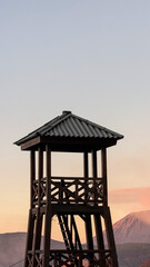 lifeguard tower at sunset