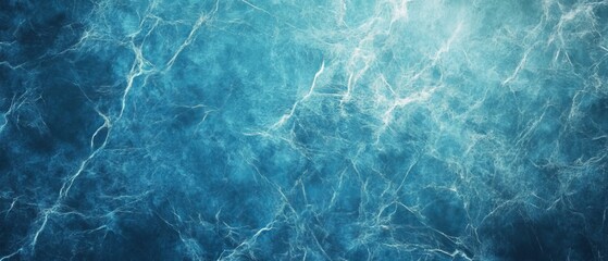 Fototapeta premium Vintage blue marbled paper background with aged texture, perfect for elegant website designs, vintage stationery, scrapbooking projects, or textured paper art, ideal for adding a classic touch to invi