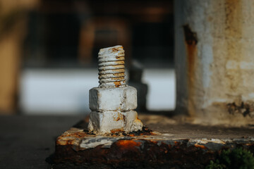 close up rusty screw nuts and bolts on light poles. close up photo. selective focus photo