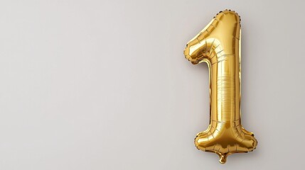 A shiny gold foil balloon in the shape of the number one floating against a clean white background.