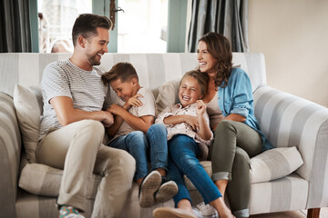 Funny, tickle and bonding with family on sofa for love, playful game and happiness together. Care,...