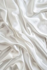 Obraz premium Close-up view of white fabric with intricate texture and patterns. Fabric possibly made of silk or satin material. Gray background creates visually striking composition.