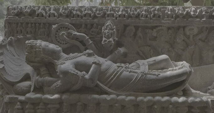Ancient Statue Sheshashayi Or Shesha Also Known Like Sheshanaga Is Serpentine Demigod -naga- And King Of Serpents nagaraja Ungraded C LOG 2. Hindu God Vishnu Is Resting On Shesha, Accompanied By His