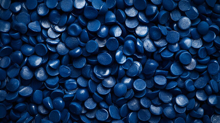 Deep blue Plastic pellets Background Close-up Plastic granules Polymer plastic beads resin polymer