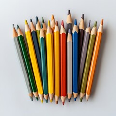 Fototapeta premium Colorful Pencil Collection on Grey Desk: Top View Editorial Photography