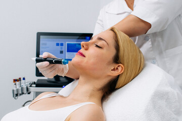 A dermatologist performs a hydro peel facial, highlighting advanced skin therapy for rejuvenation....