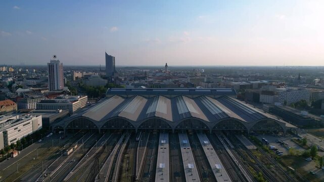 Leipzig central Terminus station, platform. Smooth aerial view flight drone