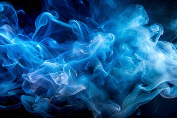 Obraz premium Abstract blue smoke swirls in dark background evoking mystical dreams and calm atmosphere