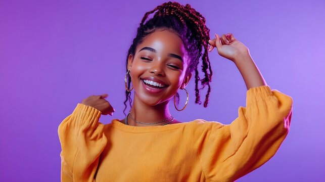 Overjoyed African American teen girl in fashionable clothes dance on violet studio background Funny black teenage young woman have fun make dancer moves Hobby and entertainment : Generative AI