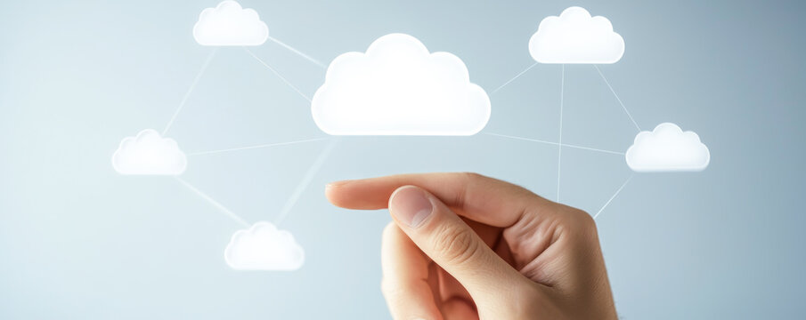 A hand interacting with digital cloud technology, symbolizing connectivity and data management in a modern environment.