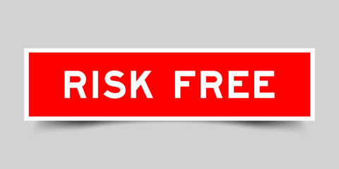 Square sticker label with word risk free in red color on gray background