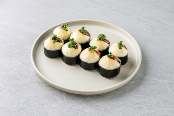 delicious fresh baked sushi roll with crab mayonnaise Philadelphia cheese.