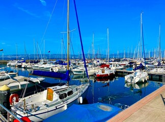 Fototapeta premium boats in the marina of the picturesque village of Evian in France on lake Geneva