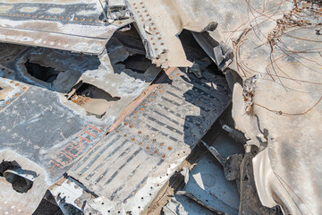 Crashed warplane, Ukrainian fighter jet remains. Texture of the remains of a crashed fighter plane Russian-Ukrainian war. Details of the plane crash