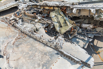 Crashed warplane, Ukrainian fighter jet remains. Texture of the remains of a crashed fighter plane Russian-Ukrainian war. Details of the plane crash