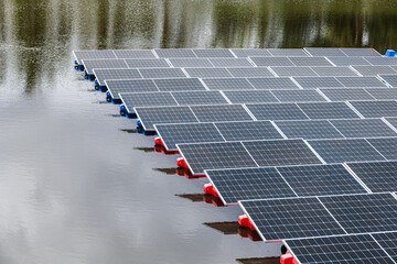 Floating Solar Panel. Solar photovoltaic panel PV System in Industry lake water pond. Saving Energy...