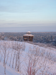 Wooden watchtower, outpost in winter.